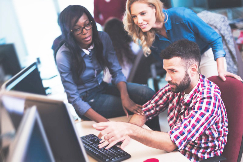 Software developers collaborating